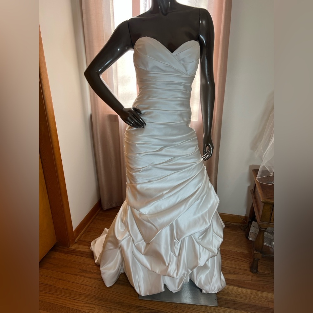 Symphony bridal mermaid style wedding gown.